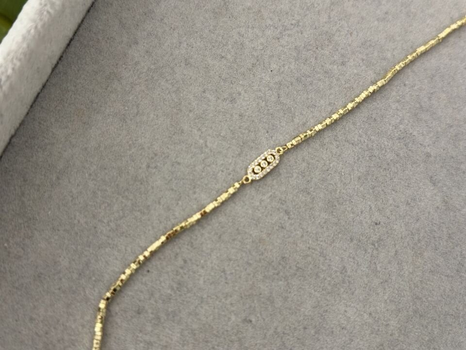 MİNİMA DORİKA VE ÜÇ TAŞ DETAYLI BİLEKLİK