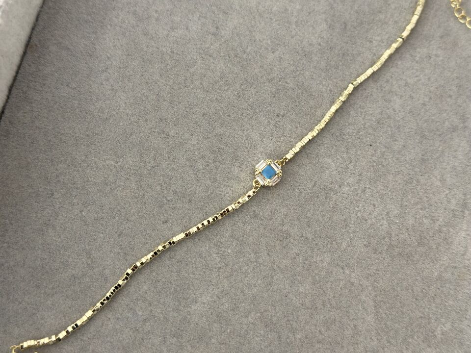 MİNİMA DORİKA VE MAVİ BAGET TAŞ DETAYLI BİLEKLİK